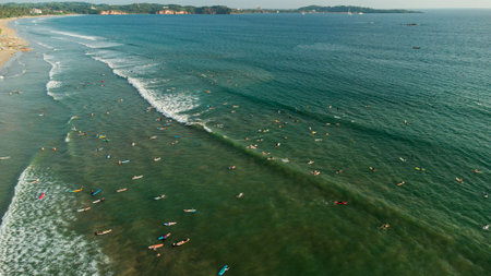 Aerial view of surfers on the beach in Phuket, Thailand