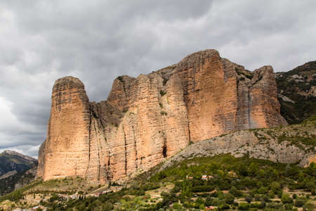 The Mallos de Riglos, geological formations located in Aragon in the Spanish Pyreneesの写真素材