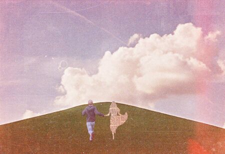 man with woman running on the hillの写真素材