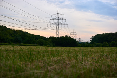 Power pole in a sunsetの写真素材
