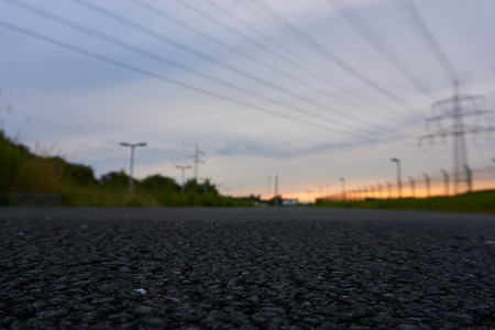 Power pole in a sunsetの写真素材