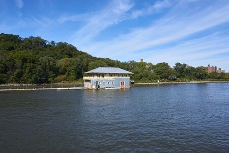 a small hut on the waterの写真素材