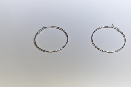 Silver round girl earringsの写真素材