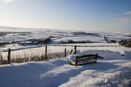 Bench in snowの写真素材