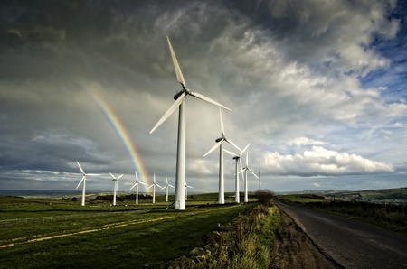 Wind turbines and rainbowの写真素材