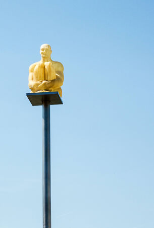 Statue of man on tall plinthのeditorial素材