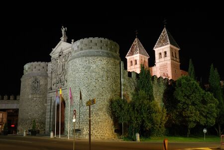 Puerta de Bisagra or Alfonso VI Gate illuminated at night, Toledo, Spain.の写真素材