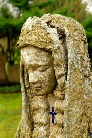 Statue of a woman at the graveyardの写真素材