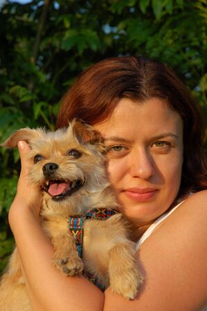 Girl and her dogの写真素材