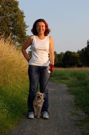 Girl and her dogの写真素材