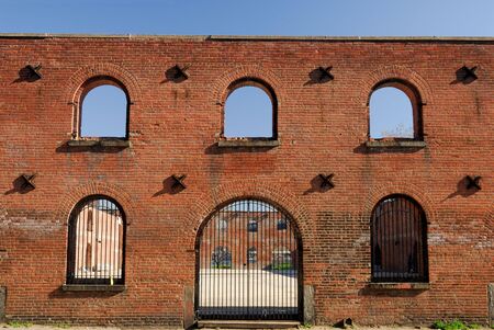Remains of an old brick warehouse docksideの写真素材