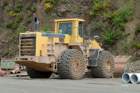 Large bulldozer in a stone pit