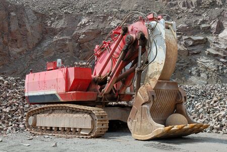 Excavator in a stone pitの写真素材