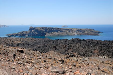 Volcanic islands Nea Kameni, Palea Kameni and Aspronisi in Greeceの写真素材