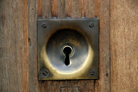 Keyhole in an old door in Franceの写真素材