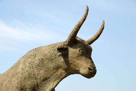 Statue of a bull in Saintes-Maries-de-la-Mer, Franceの写真素材