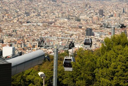 Town Panorama & Teleferic De Montjuic Seen From Montjuic Castle, Barcelona.の写真素材