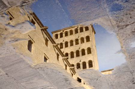 Reflection in a puddle on Placa del Reial in Barcelona, Spainの写真素材