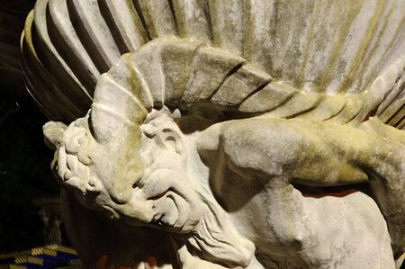 Statue at night in Barcelona Spainの写真素材
