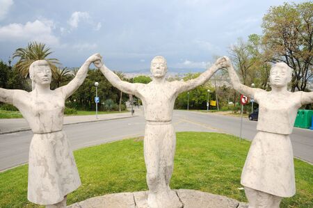 Sardana dancers statue in Barcelona Spainの写真素材