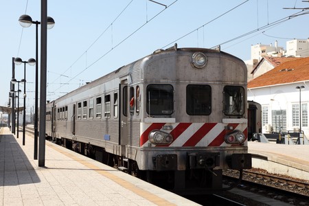 Train at railway station platform. Faro, Portugalの写真素材