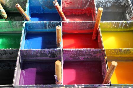 Cans with colorful paintsの写真素材