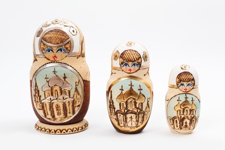 Three Russian Babushka Dolls over white backgroundの写真素材