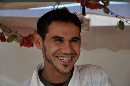 Happy orange juice seller at Djemaa el Fna square in  Marrakesh Morocco. Photo taken at 22th of November 2008のeditorial素材