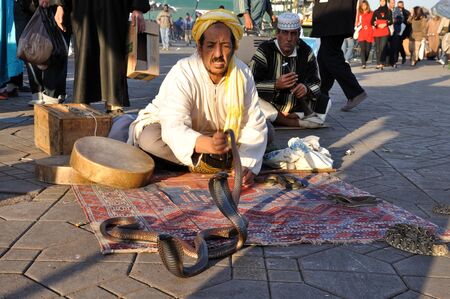 Snake charmer at Djemaa el Fna square in Marrakesh, Morocco. Photo taken at 22 of November 2008のeditorial素材