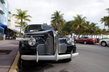 Vintage Car in Miami Beach Art Deco District Ocean Drive, Florida. Photo taken at 11th of November 2009のeditorial素材