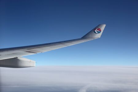 Wing of a China Eastern Airline Aircraft. Photo taken at 15th of November 2010のeditorial素材