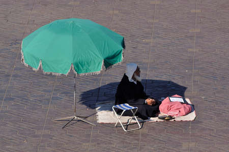 Fortune teller on Djemaa el Fna square in Marrakesh. Photo taken at 10th of November 2008のeditorial素材