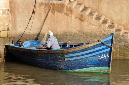 Fisherman in his boat, Essaouria Morocco. Photo taken at 15th of November 2008のeditorial素材
