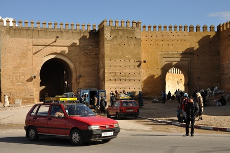 Petit Taxi in front of the old city wall of Fes, Morocco. Photo taken at 23th of November 2008のeditorial素材