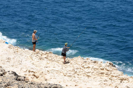 Fishermen on the coast of Fuerteventura, Canary Islands Spain. Photo taken at 1st of June 2009のeditorial素材