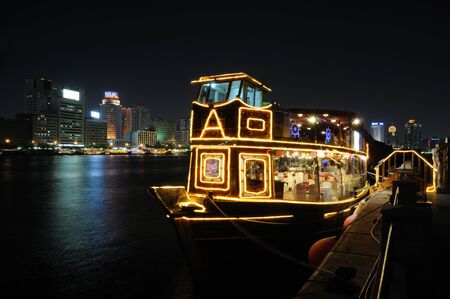 Illuminated dhow at Dubai Creek at night. Photo taken at 25th of January 2009