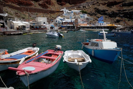 Fishing boats in the old port of Oia, Santorini Greece. Photo taken at 12th of June 2008のeditorial素材