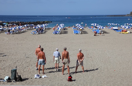 Men playing Petanque on the beach. Playa de las Vistas, Los Cristianos, Tenerife Spain. Photo taken at 24th of February 2011のeditorial素材