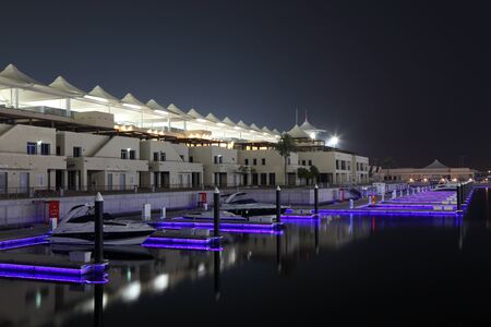 Yas Marina in Abu Dhabi illuminated at night. United Arab Emiratesのeditorial素材