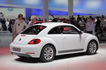 FRANKFURT - SEPT 24: The New VW Beetle at the 64th IAA (Internationale Automobil Ausstellung) on September 24, 2011 in Frankfurt, Germanyのeditorial素材