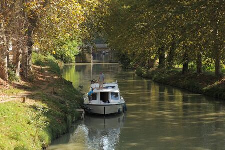 Boat on Canal du Midi near Beziers, southern France. Photo taken at 2nd of October 2011のeditorial素材
