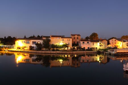 Houses waterside in Aigues-Mortes, southern Franceのeditorial素材