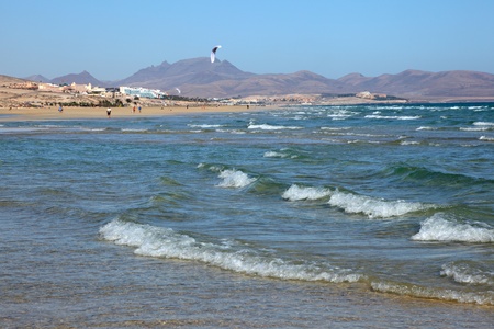 Kitesurfing on the beach on Canary Island Fuerteventura, Spain. Photo taken at 21st of December 2011