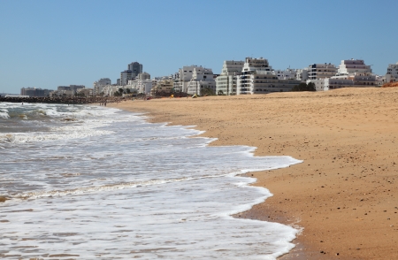 Surf on the beach of Quarteira, Algarve Portugal, Photo taken at 29th of June 2012のeditorial素材