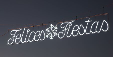 Felices Fiestas - Happy Holidays in Spanish. Street decoration in Spain at Christmas timeの写真素材