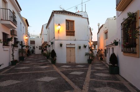 Street in spanish town Estepona at dusk, Andalusia, Spain