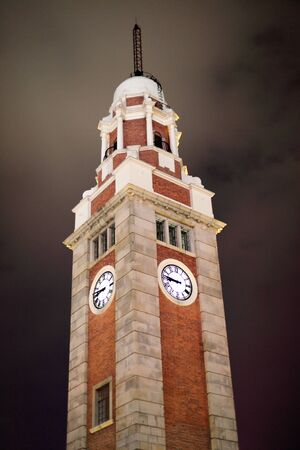 Tsim Sha Tsui Clock Tower at night. Hong Kong, Chinaの写真素材