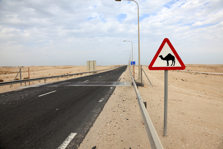 Camels crossing sign in Qatar, Middle Eastの写真素材
