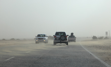 Desert highway in Qatar during sandstorm. Middle Eastのeditorial素材