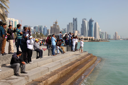 Spectators watching the Qatar National Day Air Show from the Corniche. December 18th 2013 in Doha, Qatar, Middle Eastのeditorial素材